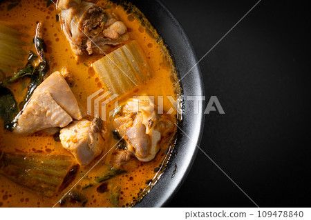 Chicken curry soup with roti Chicken curry soup with roti 109478840