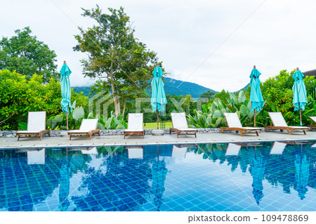 pool bed around swimming pool with mountain hill background 109478869