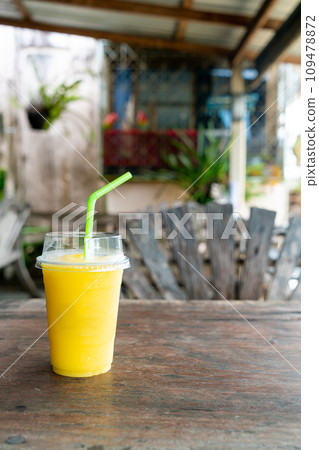 mango smoothies in take away glass mango smoothies in take away glass 109478872