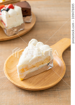 coconut cake on wood plate coconut cake on wood plate 109478895