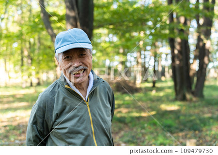 A man in his 70s running 109479730