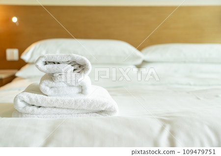 close-up white towel on bed close-up white towel on bed 109479751
