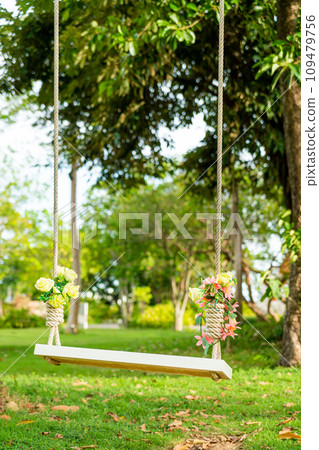 close-up beautiful white swing in park close-up beautiful white swing in park 109479756