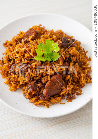 Nasi goreng - fried rice with pork in Indonesia style Nasi goreng - fried rice with pork in Indonesia style 109480036