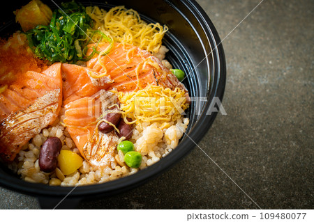 grilled salmon with brown rice donburi grilled salmon with brown rice donburi 109480077
