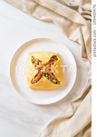 egg wrap or stuffed egg with minced pork and vegetable egg wrap or stuffed egg with minced pork and vegetable 109480476
