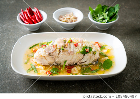 steamed sea bass fish with herbs 109480497
