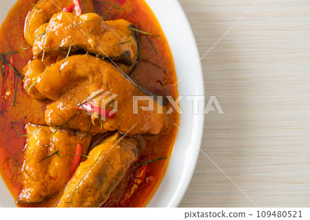 Redtail Catfish Fish in Dried Red Curry Sauce that called Choo Chee Redtail Catfish Fish in Dried Red Curry Sauce that called Choo Chee 109480521