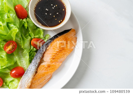 grilled salmon fillet steak with salad grilled salmon fillet steak with salad 109480539