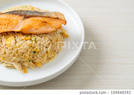 fried rice with grilled salmon fillet steak 109480543