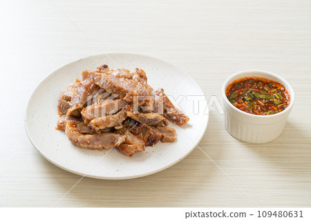 Grilled Pork Neck with Thai Spicy Sauce Grilled Pork Neck with Thai Spicy Sauce 109480631