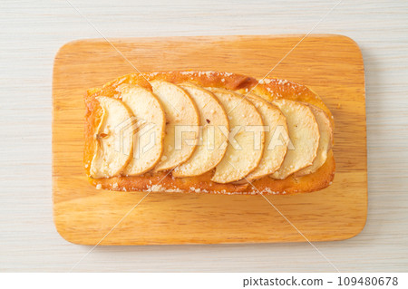 apple loaf crumbled on wood board 109480678