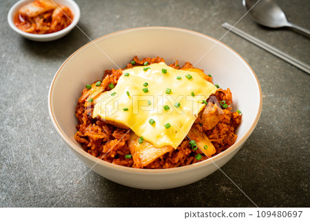 kimchi fried rice with pork and topped cheese 109480697