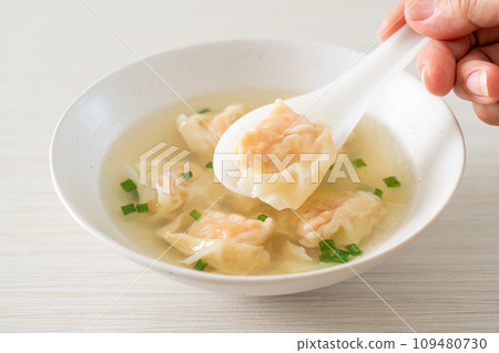 shrimp dumpling soup in white bowl shrimp dumpling soup in white bowl 109480730