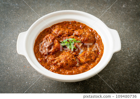 chicken tikka masala spicy curry meat food with roti or naan bread chicken tikka masala spicy curry meat food with roti or naan bread 109480736