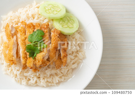 Steamed Rice with Fried Chicken or Hainanese Chicken Rice 109480750