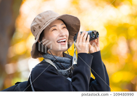 Hiking female yellow leaves Hiking female yellow leaves 109480990