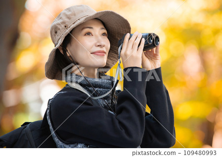 Hiking female yellow leaves Hiking female yellow leaves 109480993