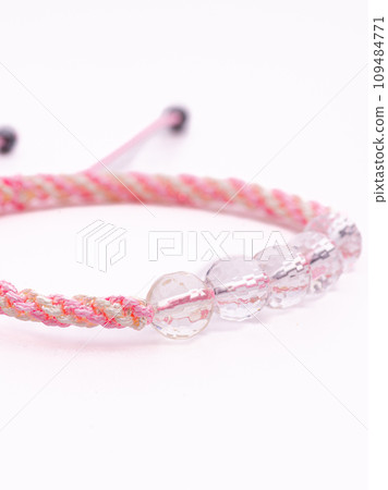 Woman hand with bracelets show thumb up symbol isolated on white background ,clipping path included for design. Woman hand with bracelets show thumb up symbol isolated on white background ,clipping path included for design. 109484771
