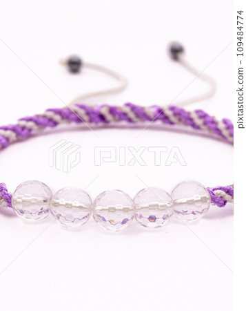 Woman hand with bracelets show thumb up symbol isolated on white background ,clipping path included for design. Woman hand with bracelets show thumb up symbol isolated on white background ,clipping path included for design. 109484774