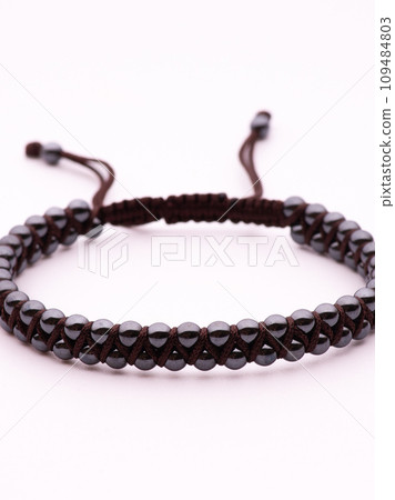 Natural stone jewelry bracelets. Lucky bracelet isolated on white background. Handmade bead bracelet, bracelet made of stone round, Colorful, studio quality, agate, lava Natural stone jewelry bracelets. Lucky bracelet isolated on white background. Handmade bead bracelet, bracelet made of stone round, Colorful, studio quality, agate, lava 109484803