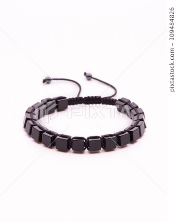 Natural stone jewelry bracelets. Lucky bracelet isolated on white background. Handmade bead bracelet, bracelet made of stone round, Colorful, studio quality, agate, lava Natural stone jewelry bracelets. Lucky bracelet isolated on white background. Handmade bead bracelet, bracelet made of stone round, Colorful, studio quality, agate, lava 109484826