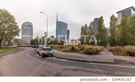 Panorama showing skyscrapers and towers from park with green lawn timelapse in Milan 109485167