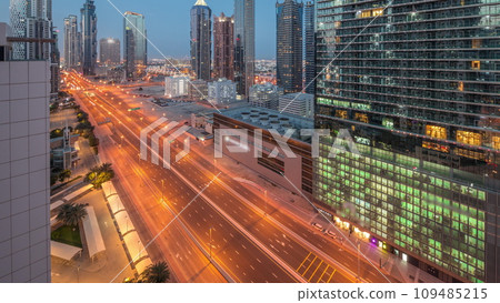 Business bay district skyline with modern architecture night to day timelapse from above. Business bay district skyline with modern architecture night to day timelapse from above. 109485215