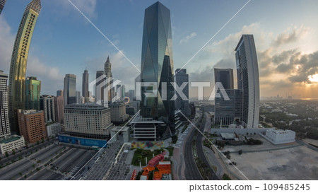 Panorama of Dubai International Financial district aerial night to day timelapse. View of business office towers. Panorama of Dubai International Financial district aerial night to day timelapse. View of business office towers. 109485245
