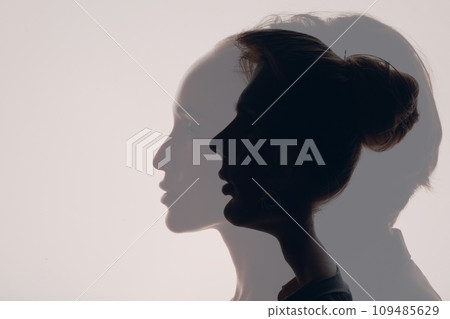 Love of couple young man and woman double exposure silhouettes Love of couple young man and woman double exposure silhouettes 109485629