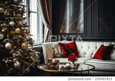 A coffee table with Xmas decor on a background of a sofa and a Christmas tree in the room. A coffee table with Xmas decor on a background of a sofa and a Christmas tree in the room. 109485923