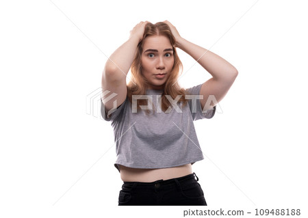 Headshot portrait of excited teenage girl in gray t-shirt Headshot portrait of excited teenage girl in gray t-shirt 109488188