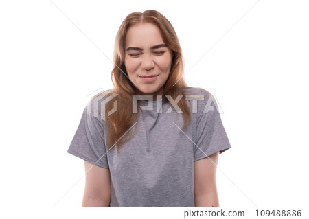 Teenage girl with light brown hair close-up on a white background Teenage girl with light brown hair close-up on a white background 109488886