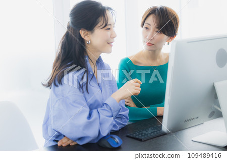 two businesswomen two businesswomen 109489416