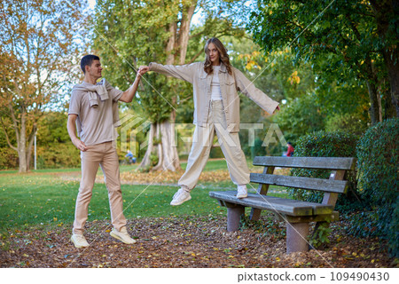 Warm Embrace of Teen Love in the Autumn Park. Capturing Teen Moments: Love Blossoms in Autumn's Embrace. Teenagers in Love: Embracing the Autumn Vibe Warm Embrace of Teen Love in the Autumn Park. Capturing Teen Moments: Love Blossoms in Autumn's Embrace. Teenagers in Love: Embracing the Autumn Vibe 109490430