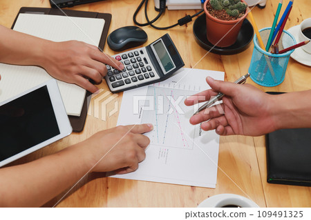 Business team meeting and discussing project plan. Businessmen discussing together in meeting room. Professional investor working with business project together. Finance managers task. 109491325