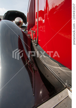 Polished Elegance: Reflections on a Classic Car 109491837