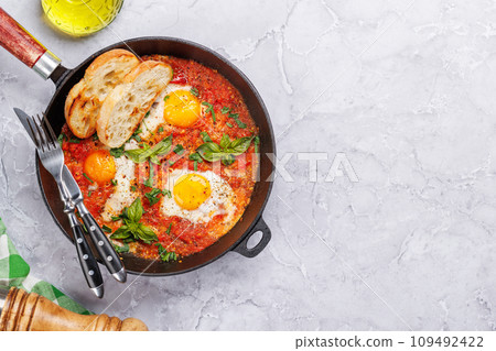 Delicious shakshuka breakfast in a pan Delicious shakshuka breakfast in a pan 109492422