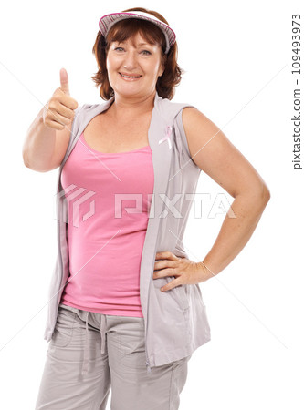 Mature woman portrait, breast cancer ribbon and thumbs up for awareness, disease recovery fitness or support agreement. Emoji like icon, survivor feedback or model studio campaign on white background 109493973