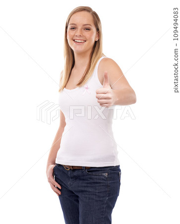 Happy woman, portrait and thumbs up for breast cancer, support or awareness against a white studio background. Blonde female person smile with like emoji, yes sign or OK with pink ribbon for campaign Happy woman, portrait and thumbs up for breast cancer, support or awareness against a white studio background. Blonde female person smile with like emoji, yes sign or OK with pink ribbon for campaign 109494083