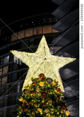 Illuminated Christmas Tree at Battersea Power station during Christmas time in London, UK Illuminated Christmas Tree at Battersea Power station during Christmas time in London, UK 109494086