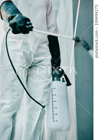 Covid pandemic outbreak cleaner and healthcare worker in protective ppe to prevent spread of virus outside. Professional in hazmat suit cleaning and disinfecting the street or building for hygiene 109494273