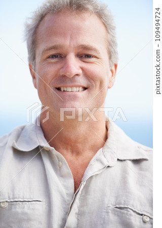 Mature, man and happy portrait on holiday at beach with freedom, adventure or retirement. Smile, outdoor and face of senior person on vacation to relax on cruise with blue sky, background or closeup 109494724