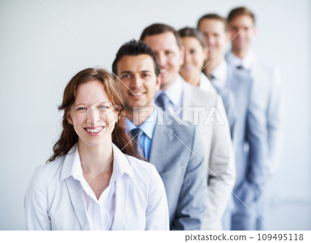Woman, portrait and leader in interview row, employees and ready for selection process. Worker, corporate accountant in suit or professional in workplace, colleagues in background and confident Woman, portrait and leader in interview row, employees and ready for selection process. Worker, corporate accountant in suit or professional in workplace, colleagues in background and confident 109495118