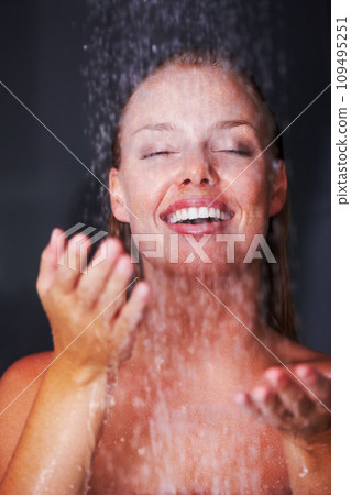 Shower, woman and water drops in studio for relax, healthy skincare or wellness with peace in mockup. Young model, happy and natural glow of cleaning body and self care for beauty by black background Shower, woman and water drops in studio for relax, healthy skincare or wellness with peace in mockup. Young model, happy and natural glow of cleaning body and self care for beauty by black background 109495251