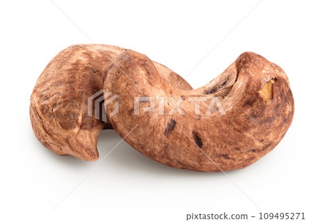 cashew nuts heap with shell isolated on white background 109495271