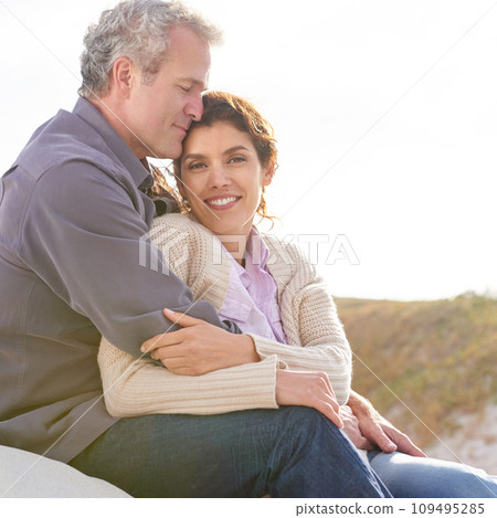Couple, face and smile in nature with hug for romance, love and relationship outdoor with relaxing. Mature, man and woman or embrace with happy, peace and comfort for bonding, honeymoon and support Couple, face and smile in nature with hug for romance, love and relationship outdoor with relaxing. Mature, man and woman or embrace with happy, peace and comfort for bonding, honeymoon and support 109495285