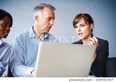 Business people, teamwork and laptop with brainstorming, ideas and planning with collaboration, company website and cooperation. Group, meeting and man with women, office and computer with support Business people, teamwork and laptop with brainstorming, ideas and planning with collaboration, company website and cooperation. Group, meeting and man with women, office and computer with support 109495407