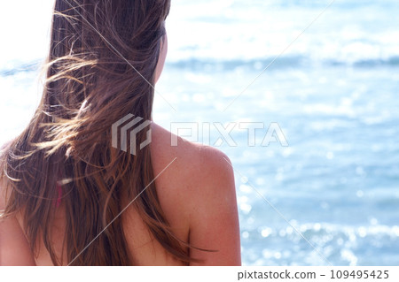Beach, summer and back of thinking woman by ocean for holiday, vacation and relaxing in nature. Travel mockup, tropical island and person with scenic view for adventure, freedom and swimming in sea 109495425