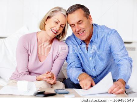 Home, financial and senior couple with documents, taxes and mortgage debt with insurance checklist, invest and asset management. Apartment, old woman and mature man with paperwork and retirement fund 109495549